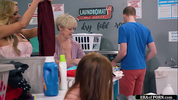 Guy fucks busty milfs in a laundry room